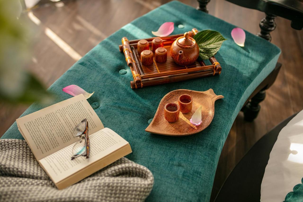 Grand Sunrise Palace Hoi An- A Luxury Indochine Hotel & Spa Luaran gambar A table runner